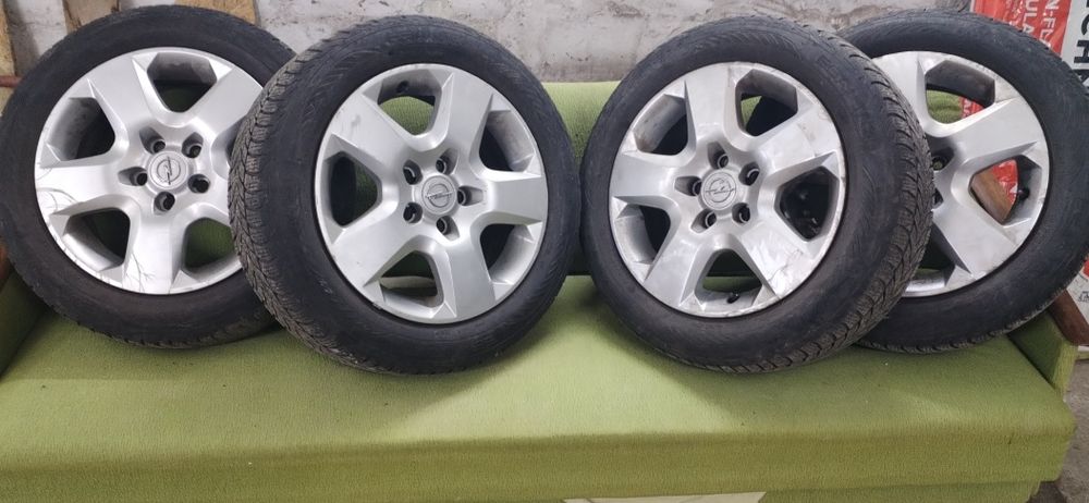 Оригінальні диски opel astra h 6.5 j*16 et 39 з гумою та ковпаками