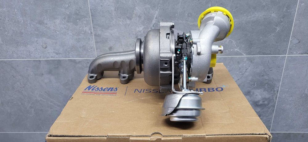 Turbosprężarka 93099 Touran Golf Seat Caddy Scoda Passat 2.0TDI 765261