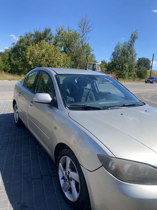 Mazda  3.   2004