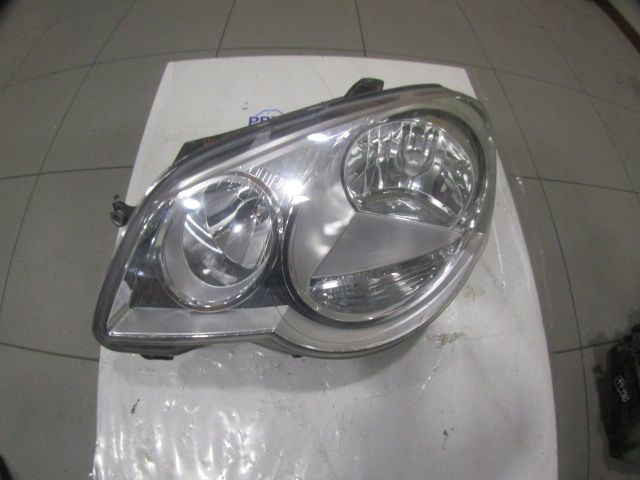 Ótica / farol esquerda VOLKSWAGEN Polo (9N)