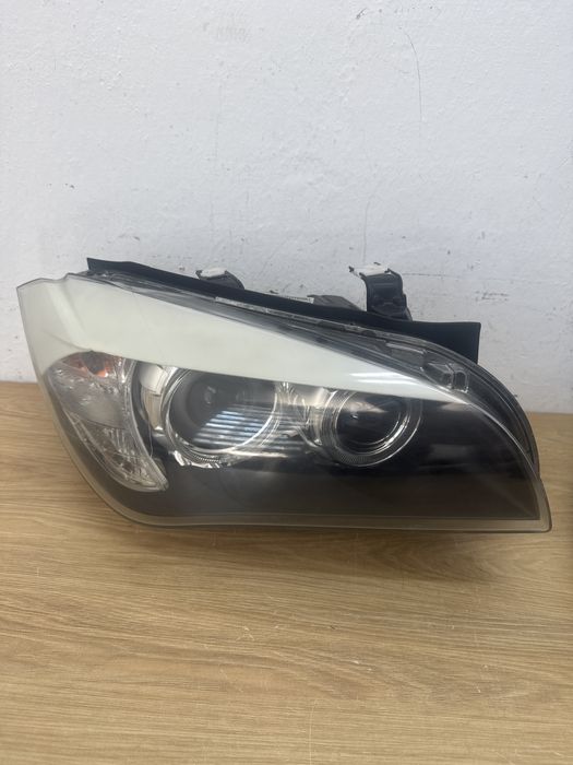 Lampy przednie BMW X1 E84 przedlift  BI XENON  Komplet