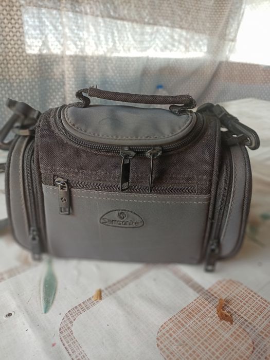 Футляр и штатив для кинокамеры.