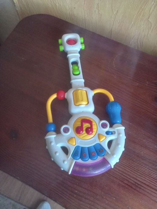 Музична гітара. Гітара іграшкова. Гітара дитяча з музикою