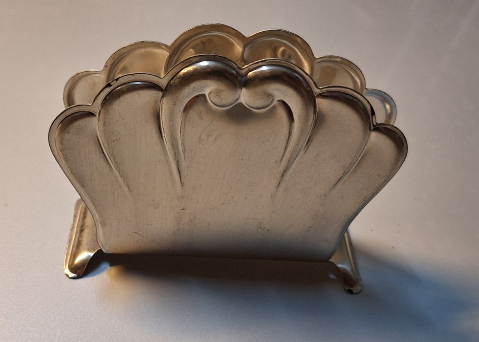 Porta guardanapos em metal.