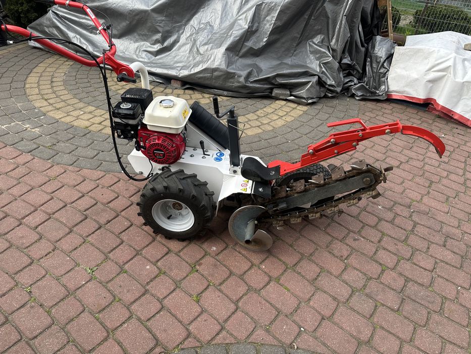 Koparka łańcuchowa z napędem wynajem