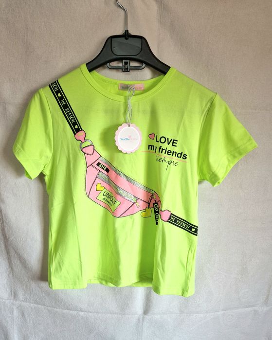 Conjunto de camisola e calção para menina. Tamanho 16 anos