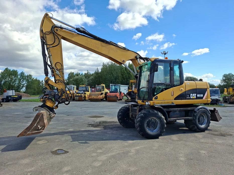 Caterpillar M 313 D  Koparka kołowa CATERPILLAR M 313 D 315 Rototilt ENGCON Sprowadzona