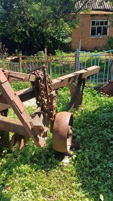 Плуг ПЛН 3-35 на автосцепці висока стійка під соняшник та кукурудзу напівгвинтовий відвал