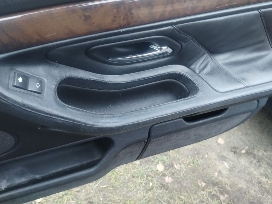 BMW e38 boczki drzwi skóra szyte rączki komplet