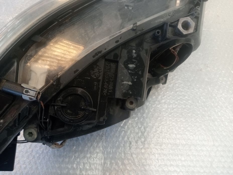 Faro esquerdo BMW 525