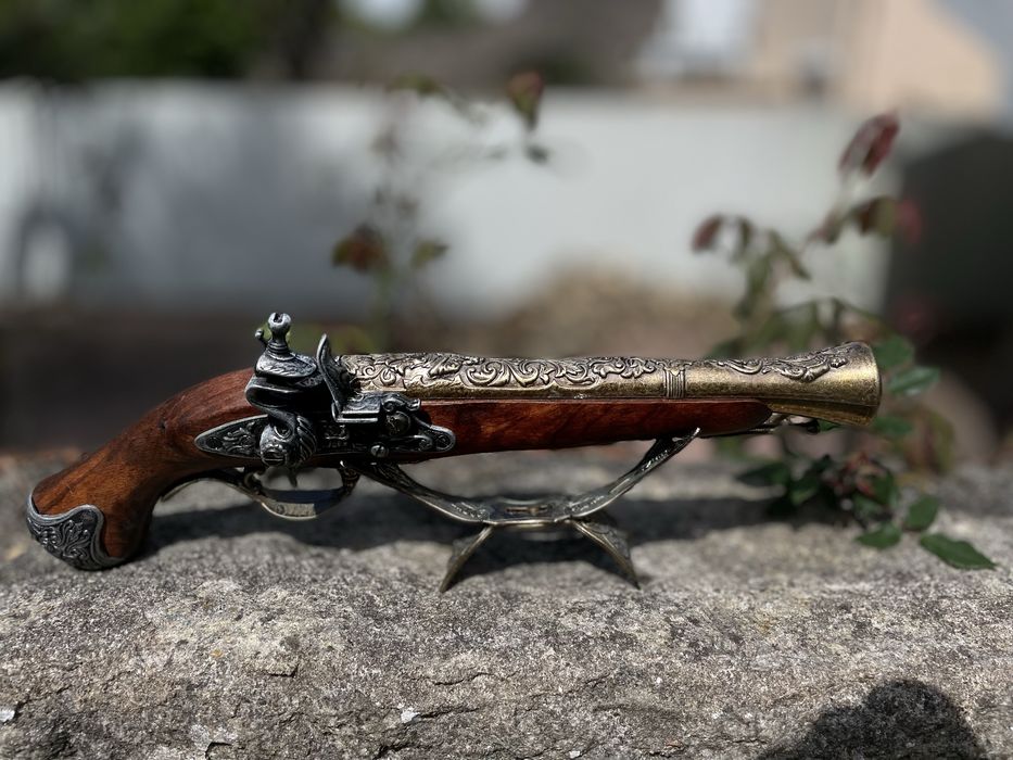 Replica de pistola antiga