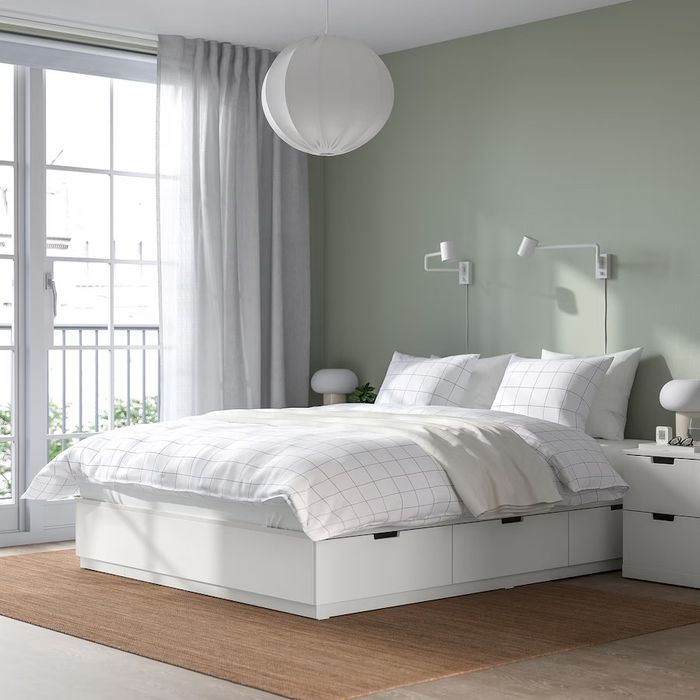 Cama de casal com arumação