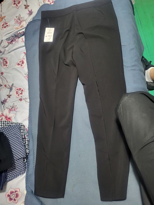 Spodnie RESERVED nowe 42