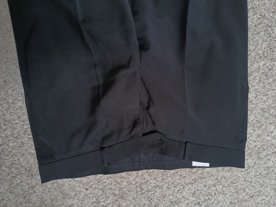 Wełniane spodnie garniturowe męskie