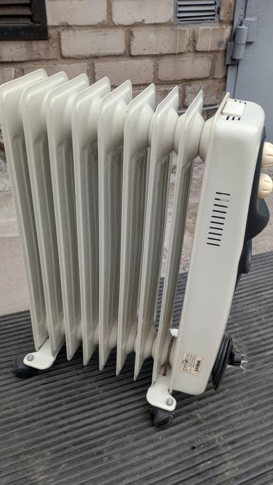 Обогреватель  масляный на ножках