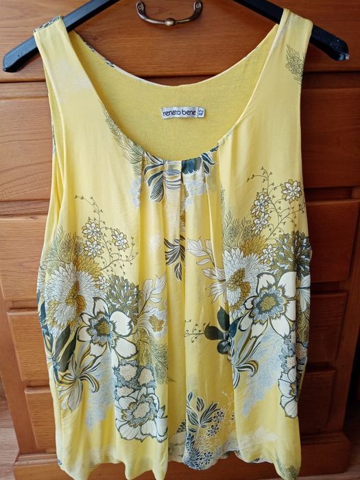 Blusa amarela como nova