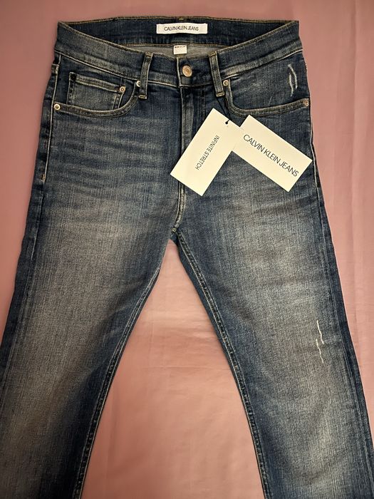 Wyprzedaż spodnie męskie Calvin Klein Jeans.