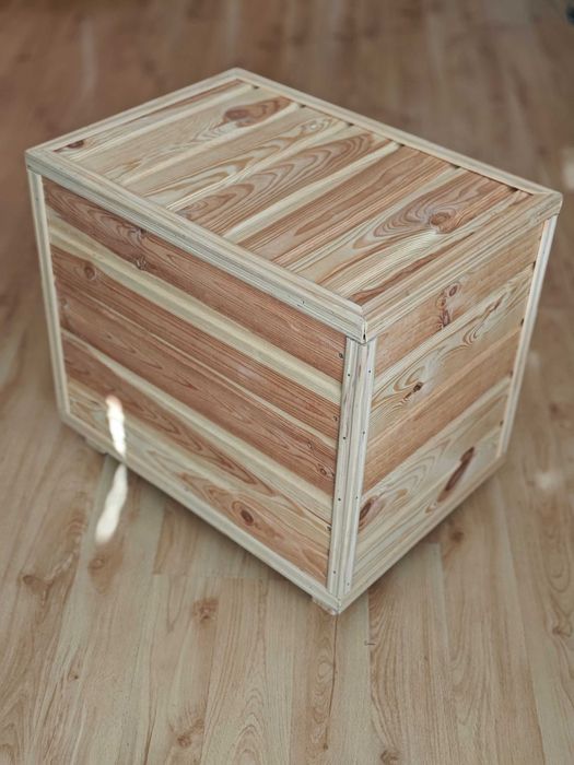 Дерев'яний будиночок для кішки