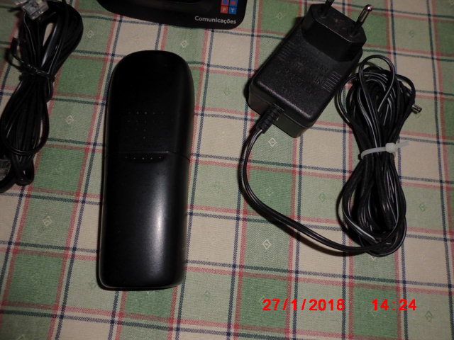 A cordless phone with a base station connected to the landline.64286377875457123