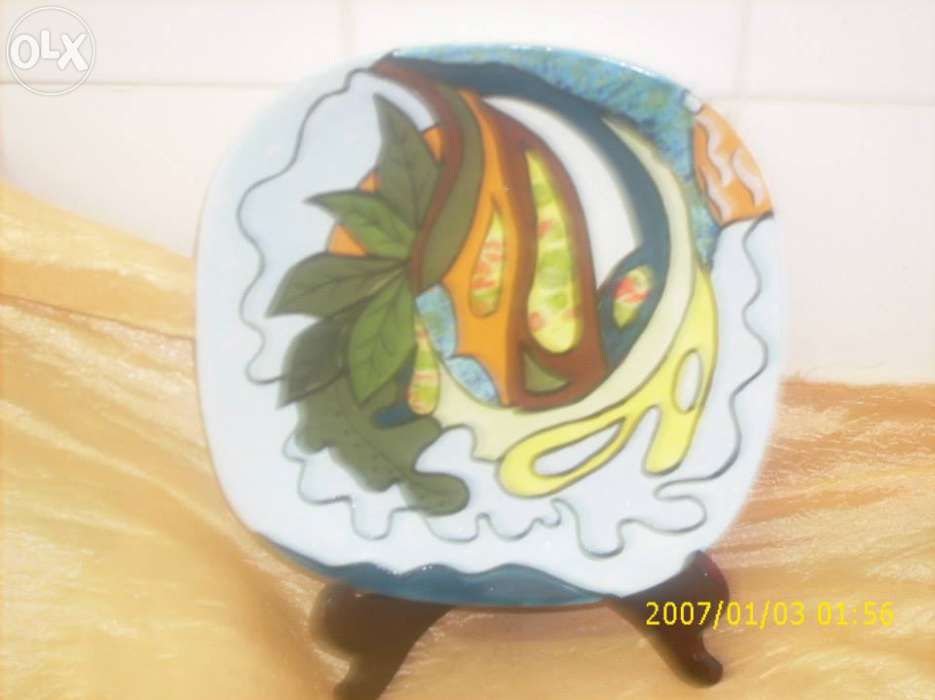 Pratos decorativos.64740283540355120