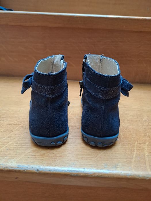 Botas em pele por dentro