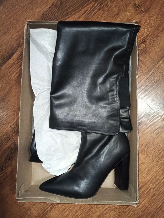 Новые женские сапоги