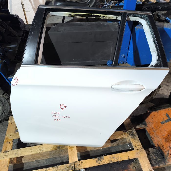Drzwi lewe tył BMW f11 kod lakieru a300