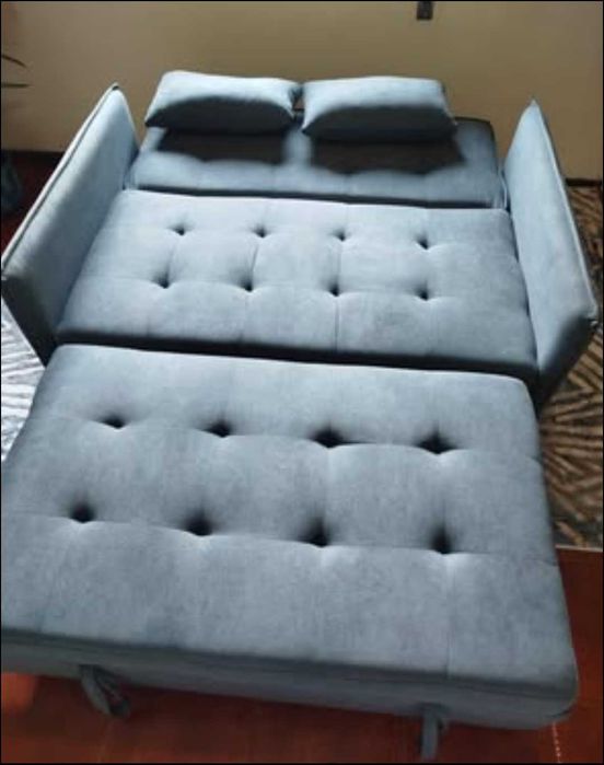Sofá - cama moderno e extremamente funcional.