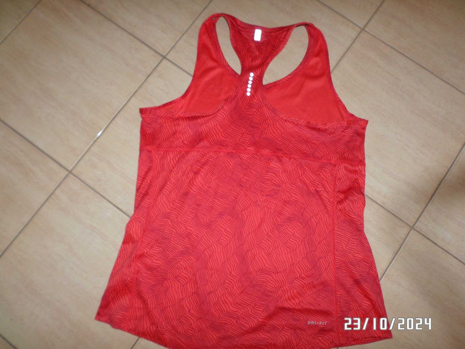 Sprzedam koszulkę sportową marki Nike-L-38/40