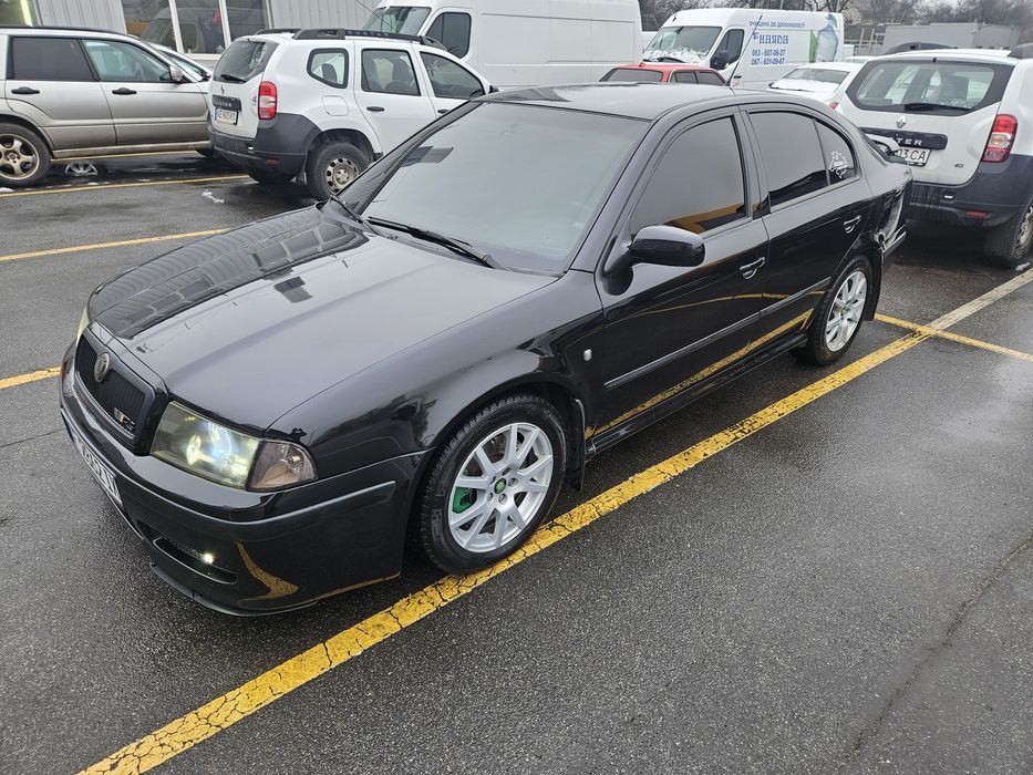 Продам шкоду тур 1.8 газ бензин