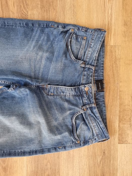 Spodnie jeans 34