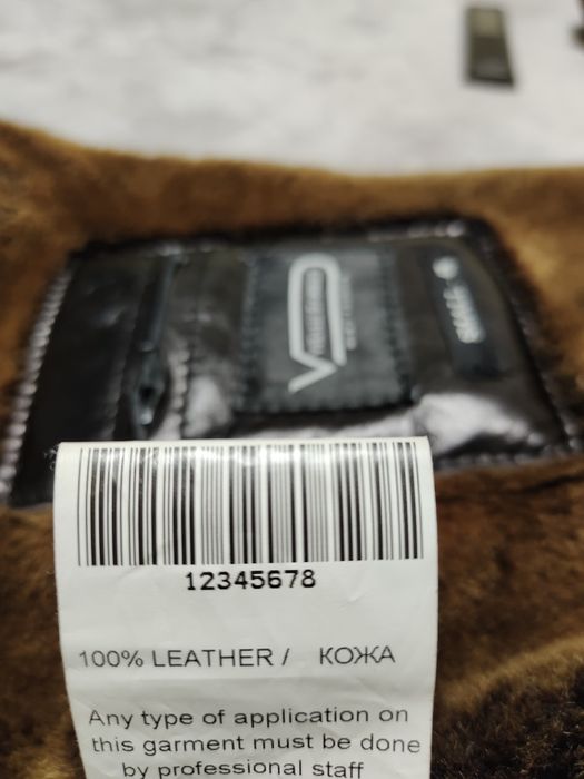 Шкіряна зимова куртка 48р