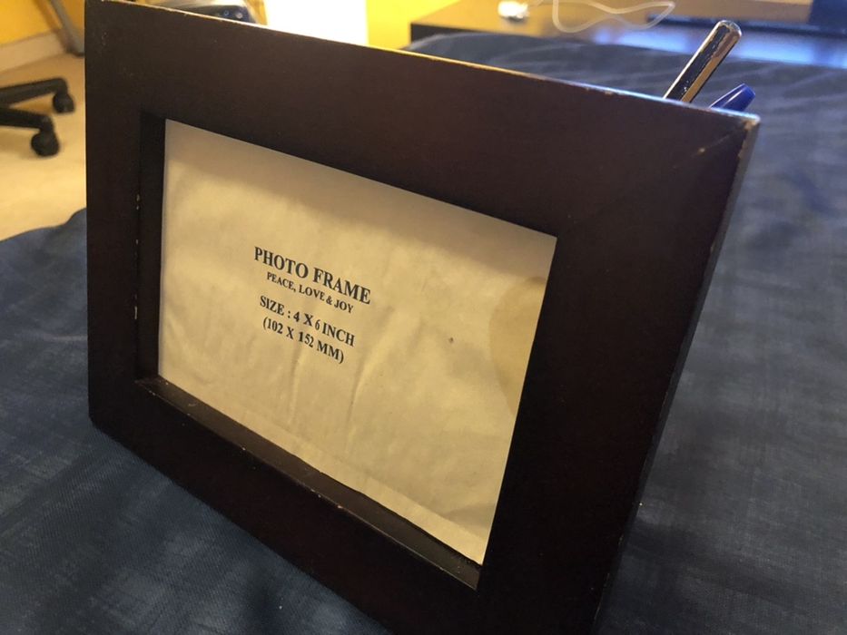 Moldura de madeira com arrumação