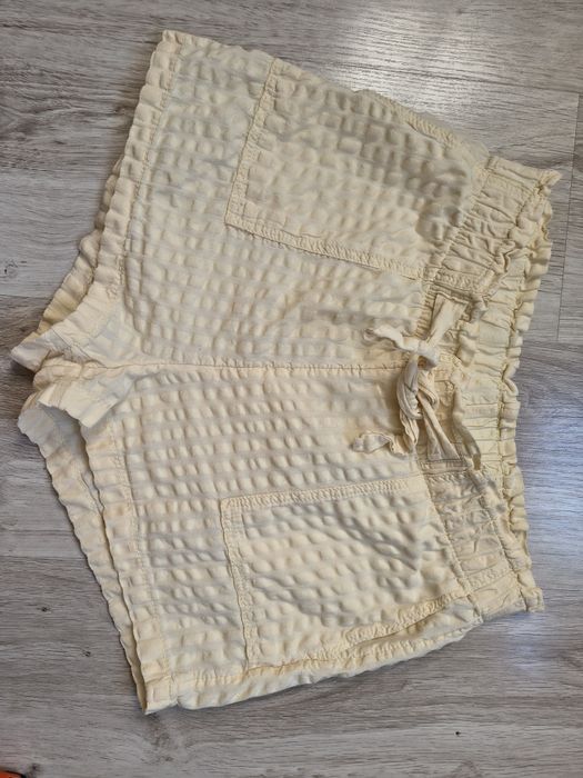 Żółte - pastelowe bawełniane spodenki 12-14 lat H&M