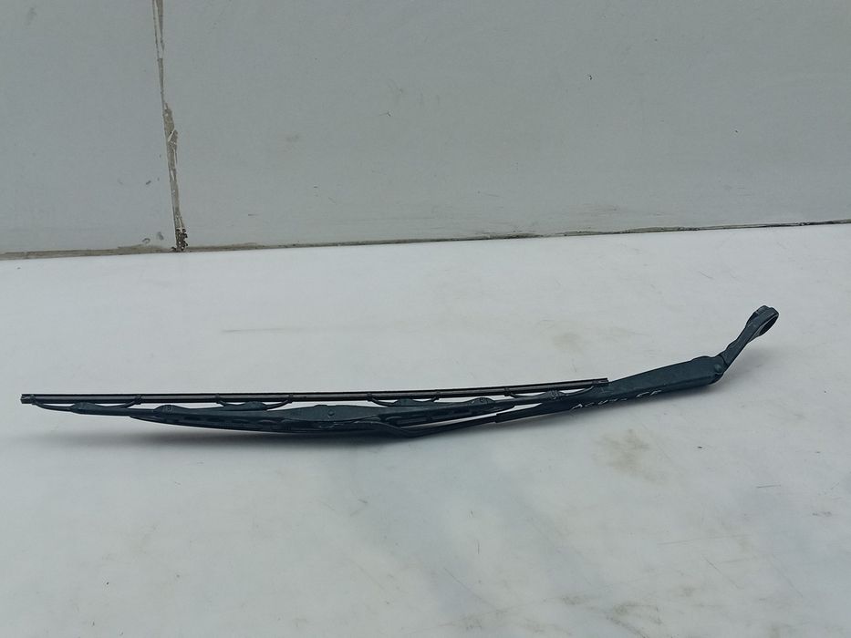 Haste / braço de escova limpa vidros frente esquerda NISSAN Micra III