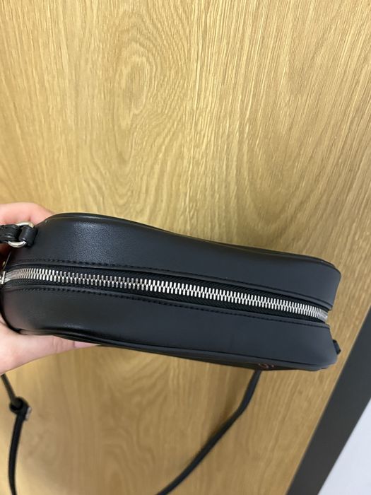 Listonosza Calvin Klein