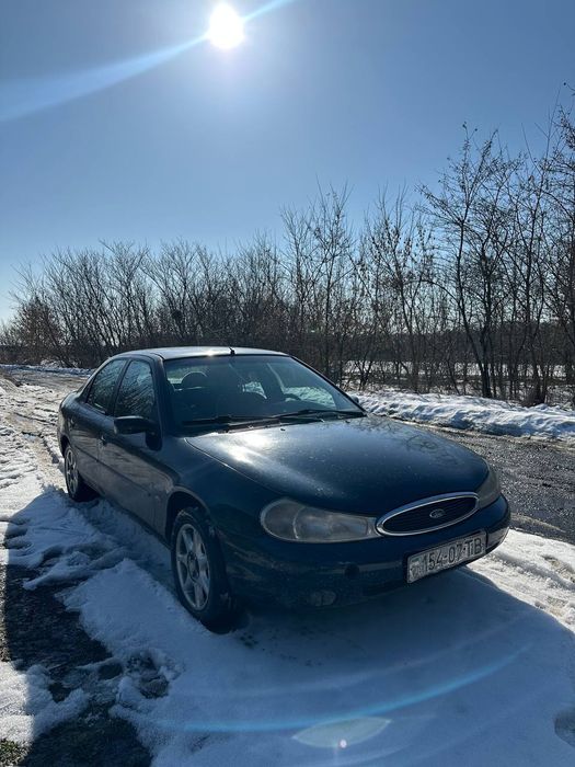 ford Mondeo 1.8 benzun на титанах