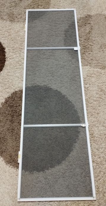 Дверь балконная с антимоскитной сеткой.