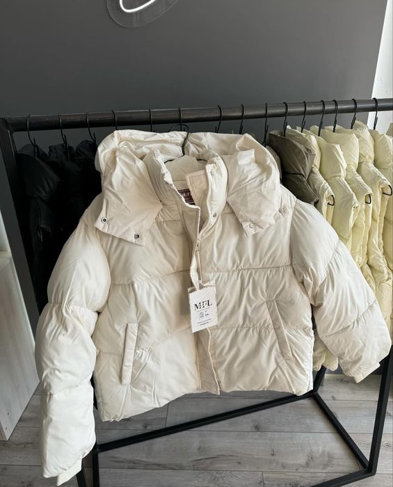 Молочний пуховик