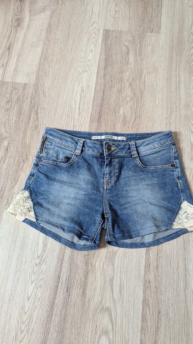 Damskie szorty krótkie letnie spodenki jeansowe Topshop M