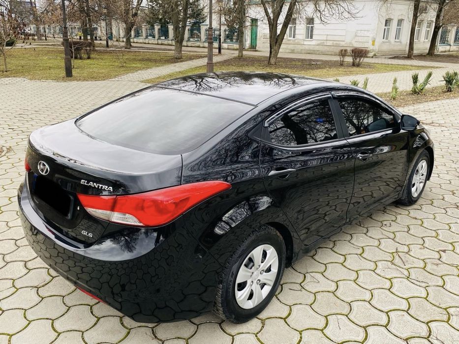 Hyundai Elantra 2013 год Газ/бензин