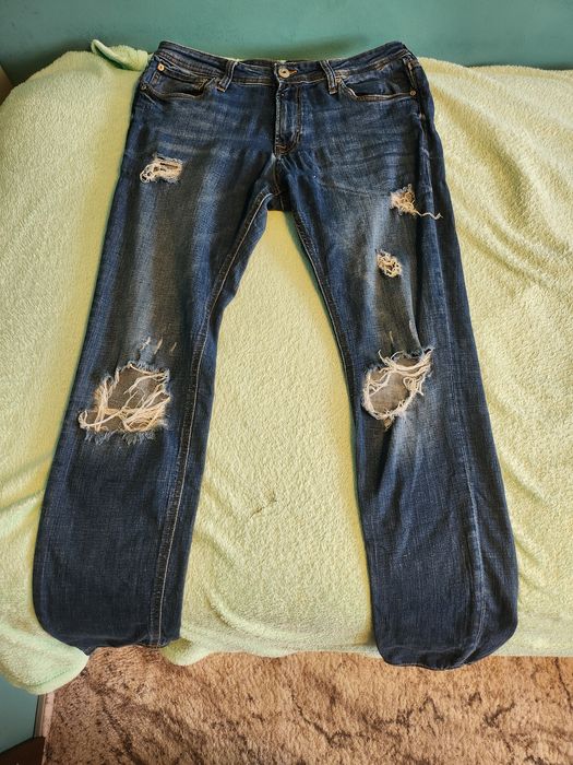 Jack & Jones jeansy Spray On Tom 32/32 | duże dziury na kolanach | bez