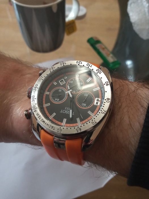 Zegarek marki Tissot srebrno pomarańczowy