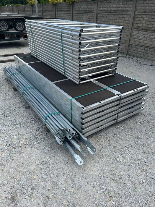Rusztowanie fasadowe aluminiowe typ Plettac LEKKIE 10,3m x 12m nowe, podesty 3 m, kompletne