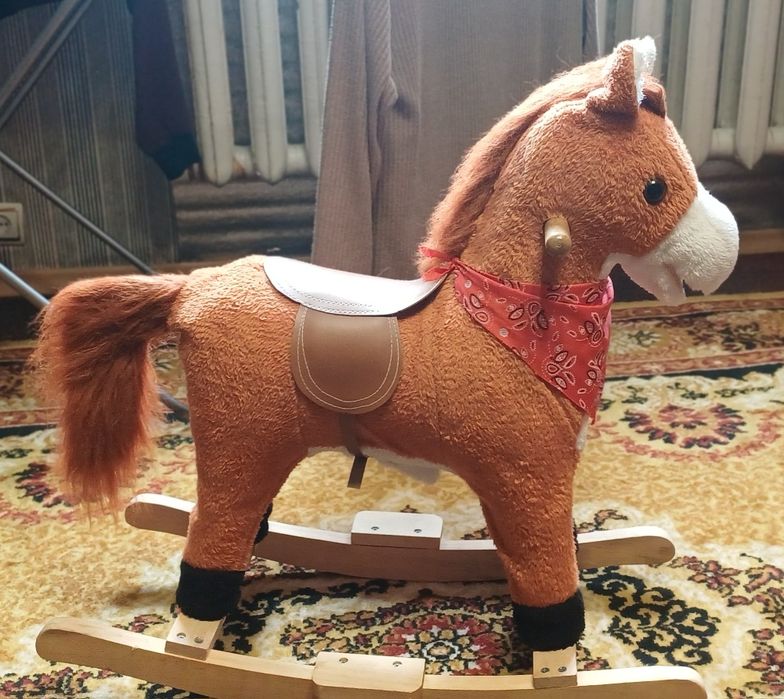 Коник гойдалка музикальний