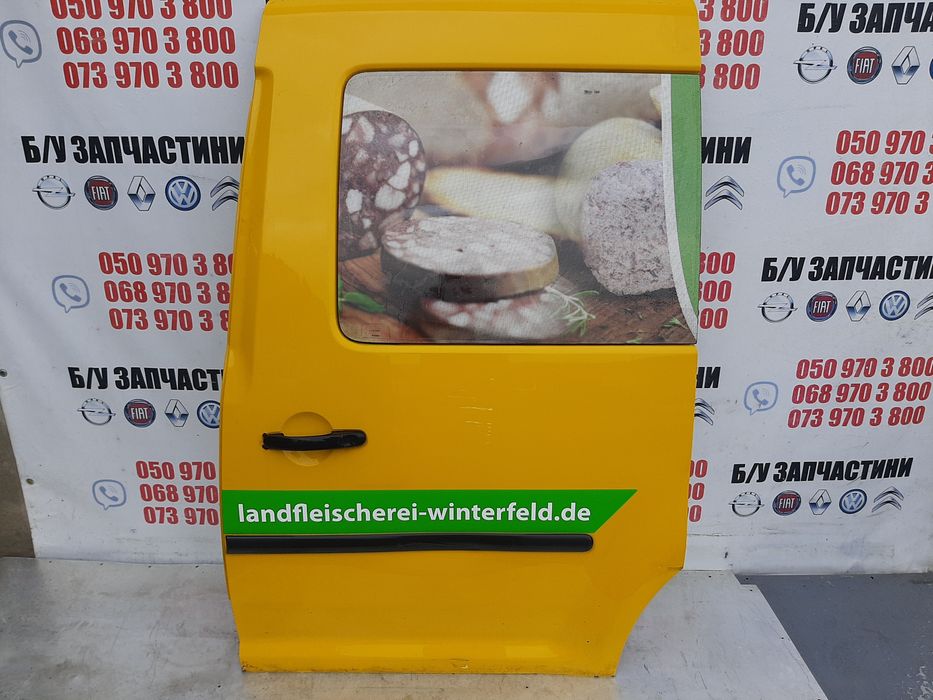 Дверка бокова ліва WV Caddy зі склом