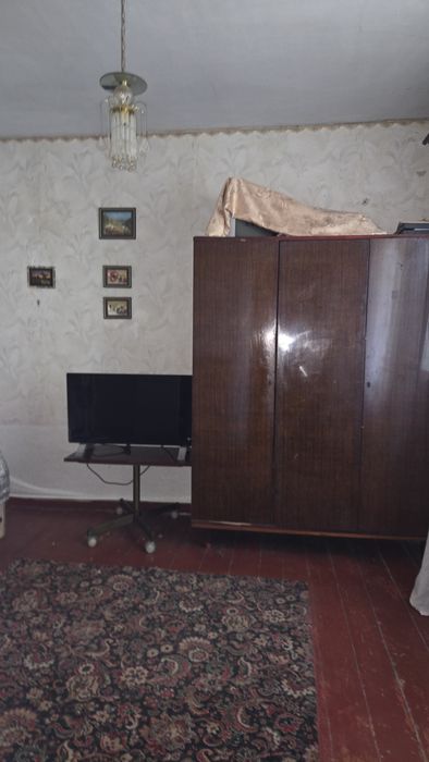 Продаж квартири в 1-поверховому будинку з присадибною ділянкою