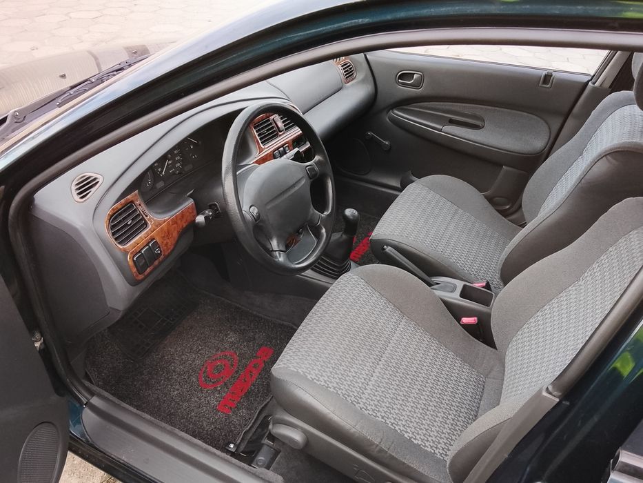Mazda 323 sedan igła stan idealny perfekcyjny top 60 tys km