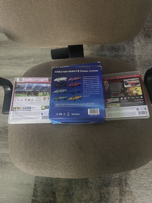 Comando de ps3+carregador+jogos