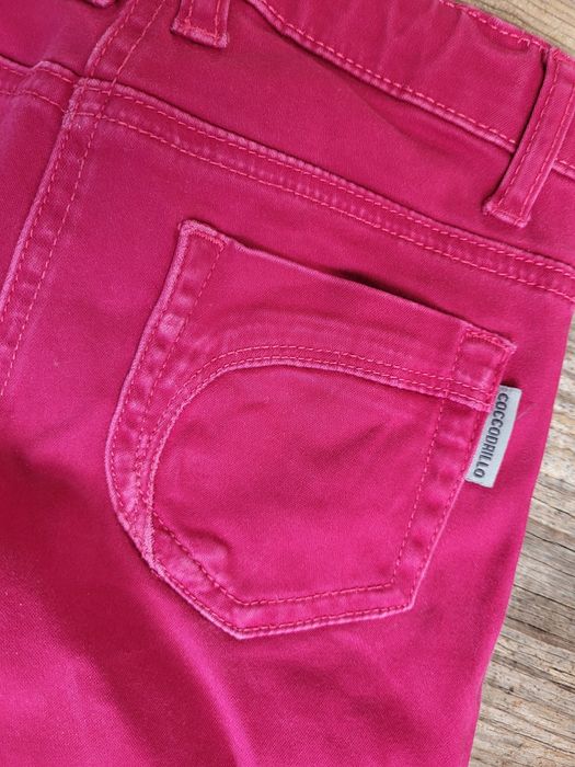 Coccodrillo Spodnie jeans różowe rozm. 110